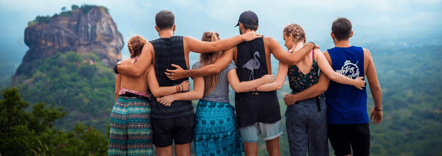 Group of people looking at a mountain